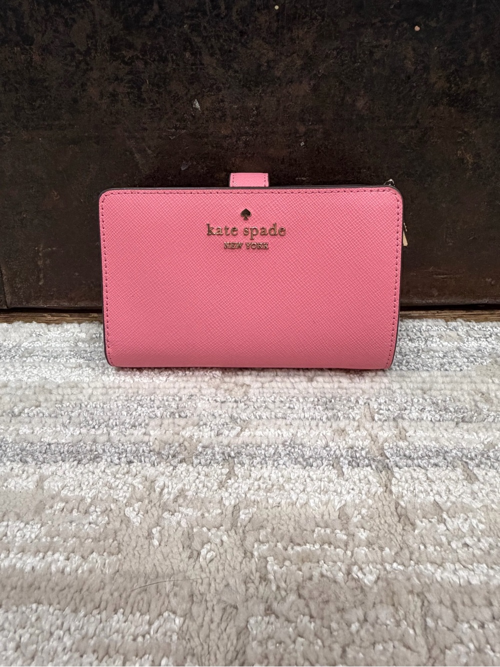 kate spade pink saffiano bi-fold wallet with logo